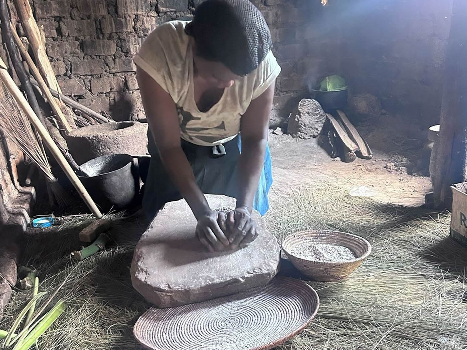 Experience traditional Ugandan coffee preparation at Muga Eco-Village